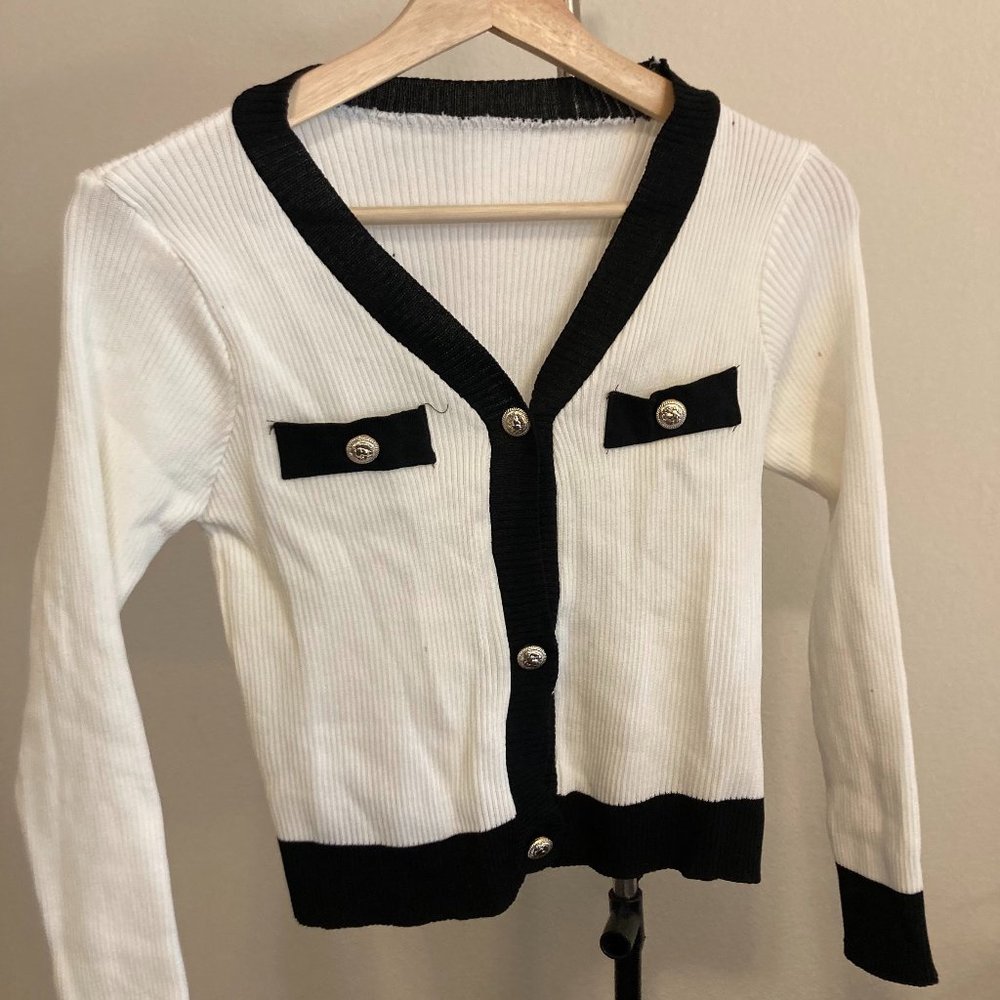 White and black sweater